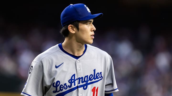 May 9, 2025; Phoenix, Arizona, USA; Los Angeles Dodgers pitcher Roki Sasaki (11) against the Arizona Diamondbacks at Chase Field. Mandatory Credit: Mark J. Rebilas-Imagn Images