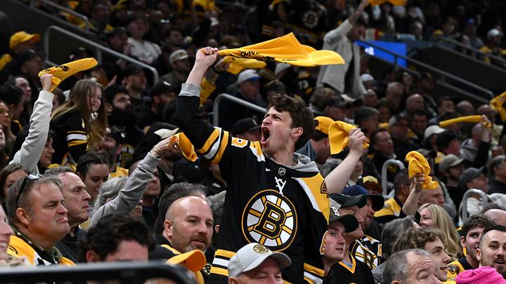 Apr 23, 2026; Boston, Massachusetts, USA; A Boston Bruins fan cheers against the Buffalo Sabres during the first period of game three of the first round of the 2026 Stanley Cup Playoffs at the TD Garden. Mandatory Credit: Brian Fluharty-Imagn Images