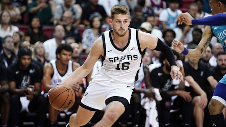 Jul 7, 2023; Las Vegas, NV, USA; San Antonio Spurs guard Erik Stevenson (16) drives the ball against the Charlotte Hornets during the second half at Thomas & Mack Center. Mandatory Credit: Lucas Peltier-Imagn Images