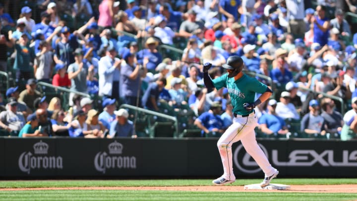 Seattle Mariners right fielder Mitch Haniger runs the bases after hitting a home run against the Toronto Blue Jays on Friday at T-Mobile Park.