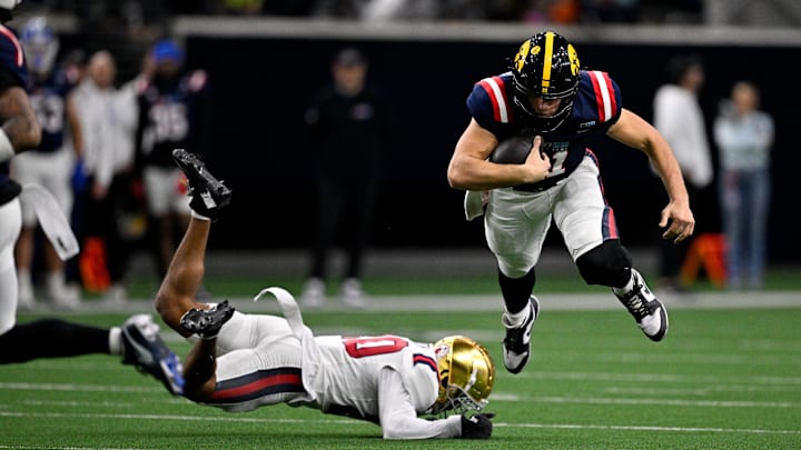 Jan 27, 2026; Frisco, TX, USA; West quarterback Mark Gronowski (11) is tackled by East cornerback DeVonta Smith (20) during the first half at the Ford Center at the Star. Mandatory Credit: Jerome Miron-Imagn Images Jan 27, 2026; Frisco, TX, USA; West quarterback Mark Gronowski (11) is tackled by East cornerback DeVonta Smith (20) during the first half at the Ford Center at the Star. Mandatory Credit: Jerome Miron-Imagn Images