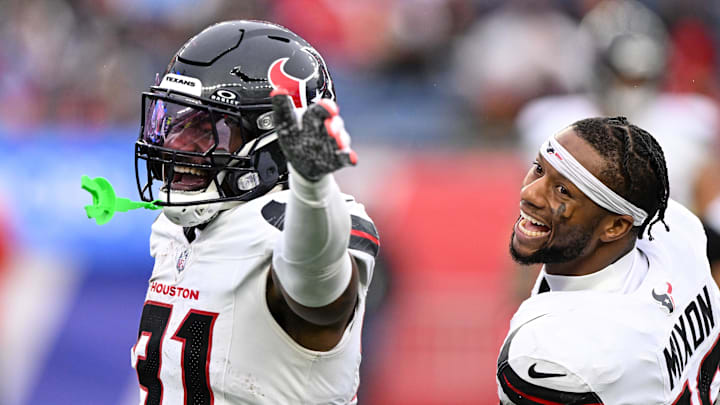 Oct 13, 2024; Foxborough, Massachusetts, USA; Houston Texans running back Dameon Pierce (31) celebrates with running back Joe Mixon (28) after scoring a touchdown against the New England Patriots during the first half at Gillette Stadium. Mandatory Credit: Brian Fluharty-Imagn Images