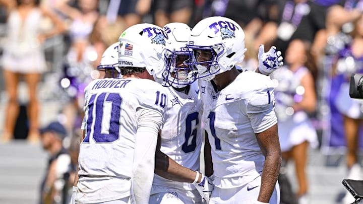 Sep 20, 2025; Fort Worth, Texas, USA; TCU Horned Frogs wide receiver Eric McAlister (1) celebrates with quarterback Josh Hoover (10) and running back Trent Battle (6) after McAlister scores a touchdown against the SMU Mustangs during the second half at Amon G. Carter Stadium. Mandatory Credit: Jerome Miron-Imagn Images