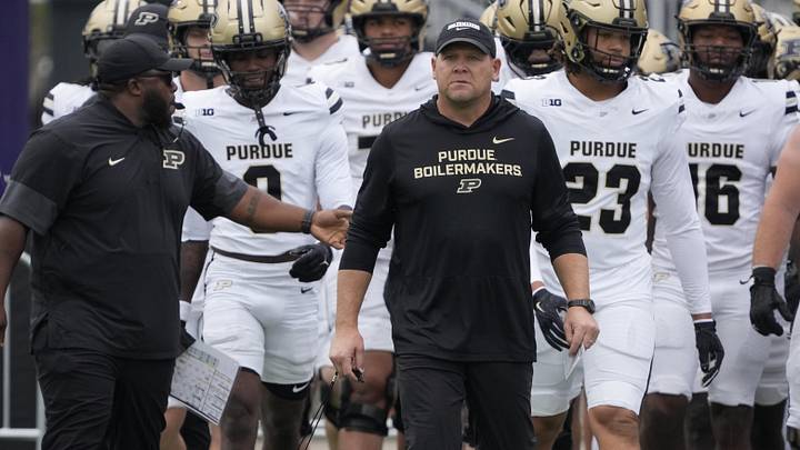 Purdue Boilermakers head coach Barry Odom takes the field.