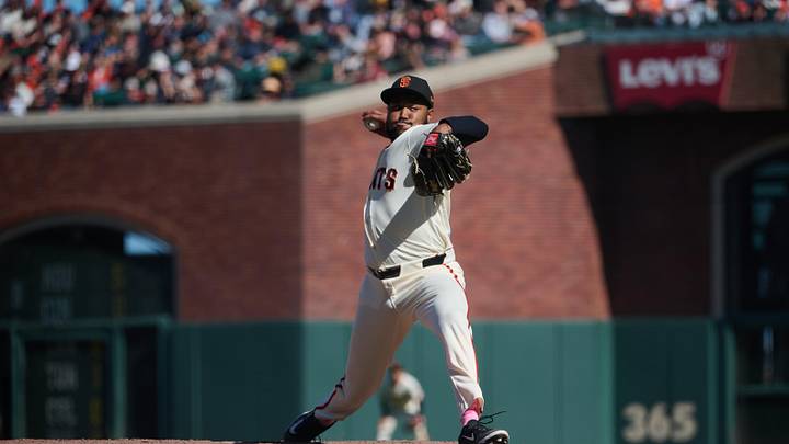 May 10, 2026; San Francisco, California, USA; San Francisco Giants pitcher Dylan Smith (66) throws a pitch against the Pittsburgh Pirates during the eleventh inning at Oracle Park. Mandatory Credit: Robert Edwards-Imagn Images