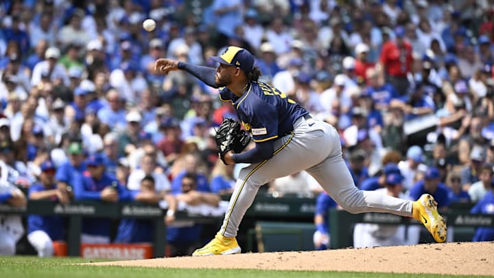 Aug 18, 2025; Chicago, Illinois, USA;  Milwaukee Brewers pitcher Freddy Peralta (51) delivers during the second inning against the Chicago Cubs at Wrigley Field. Mandatory Credit: Matt Marton-Imagn Images