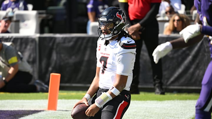 Oct 5, 2025; Baltimore, Maryland, USA; Houston Texans quarterback C.J. Stroud (7) reacts after running for a touchdown during the second quarter against the Baltimore Ravens at M&T Bank Stadium. Mandatory Credit: Rafael Suanes-Imagn Images