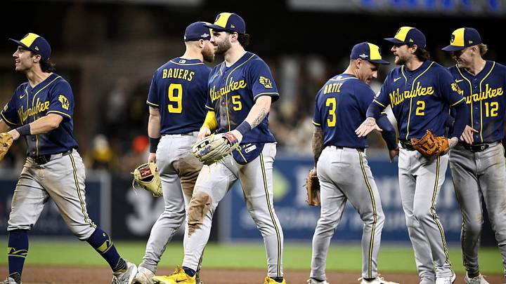 Oct 7, 2026; San Diego, California, USA;  Milwaukee Brewers center fielder Garrett Mitchell (5) celebrates with teammates after the game against the San Diego Padres in game four of the NLDS for the 2026 MLB Playoffs at Petco Park.  Mandatory Credit: Denis Poroy-Imagn Images