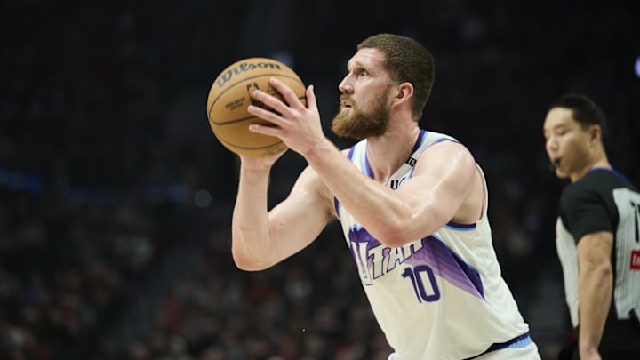 Jan 5, 2026; Portland, Oregon, USA; Utah Jazz guard Svi Mykhailiuk (10) shoots a basket during the first half against the Portland Trail Blazers at Moda Center. Mandatory Credit: Troy Wayrynen-Imagn Images