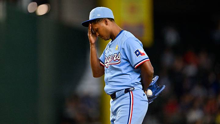 Sep 1, 2024; Arlington, Texas, USA; Texas Rangers relief pitcher Jose Leclerc (25) wipes his forehead as he pitches against the Oakland Athletics during the ninth inning at Globe Life Field. Mandatory Credit: Jerome Miron-USA TODAY Sports Sep 1, 2024; Arlington, Texas, USA; Texas Rangers relief pitcher Jose Leclerc (25) wipes his forehead as he pitches against the Oakland Athletics during the ninth inning at Globe Life Field. Mandatory Credit: Jerome Miron-USA TODAY Sports