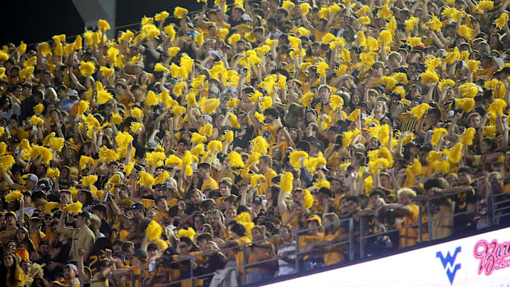 West Virginia Mountaineers fans cheer on their team during the second half against the Pittsburgh Panthers at Milan Puskar Stadium in Morgantown, WV on September 16, 2023.