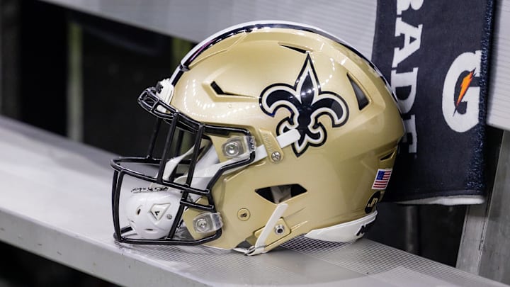 Nov 5, 2023; New Orleans, Louisiana, USA;  Detailed view of the New Orleans Saints helmet on the team bench against the Chicago Bears during the first half at the Caesars Superdome. Mandatory Credit: Stephen Lew-Imagn Images