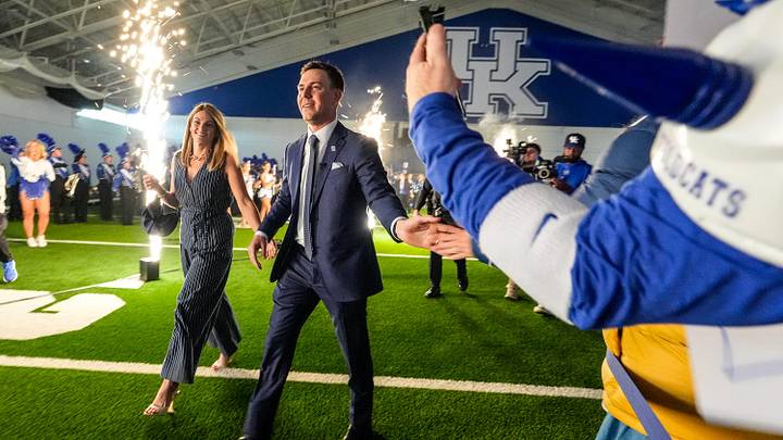 New Kentucky Wildcat head coach Will Stein arrives with wife, Darby has he is introduced at Kentucky on Wednesday, December 3, 2025
