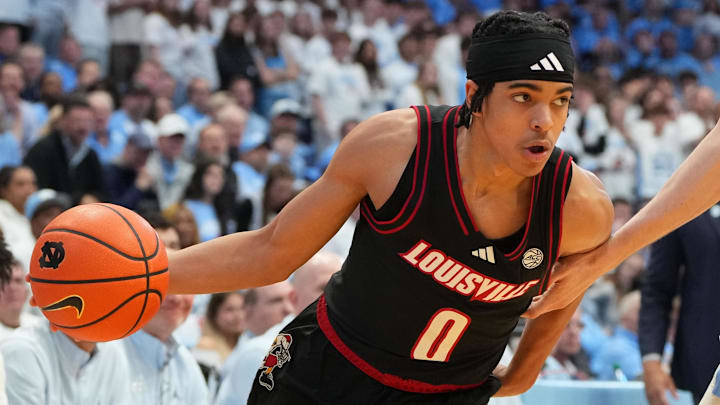 Feb 23, 2026; Chapel Hill, North Carolina, USA; Louisville Cardinals guard Mikel Brown Jr. (0) with the ball in the first half at Dean E. Smith Center. Mandatory Credit: Bob Donnan-Imagn Images Feb 23, 2026; Chapel Hill, North Carolina, USA; Louisville Cardinals guard Mikel Brown Jr. (0) with the ball in the first half at Dean E. Smith Center. Mandatory Credit: Bob Donnan-Imagn Images