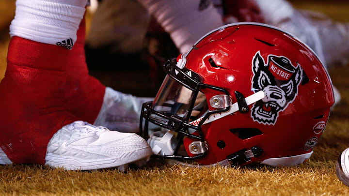 Nov 18, 2017; Winston-Salem, NC, USA; A North Carolina State Wolfpack helmet lays on the sidelines during the game against the Wake Forest Demon Deacons at BB&T Field. Mandatory Credit: Jeremy Brevard-Imagn Images