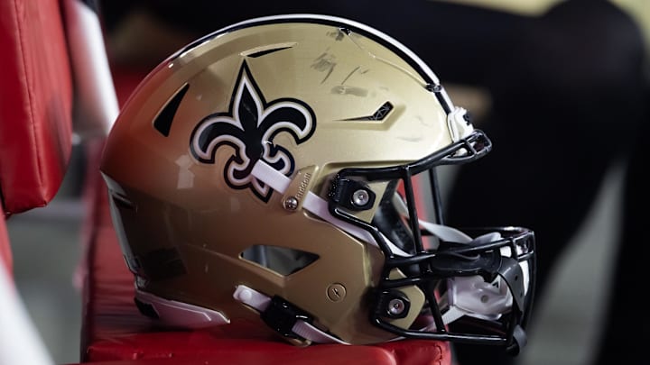 Aug 10, 2024; Glendale, Arizona, USA; Detailed view of a New Orleans Saints helmet during a preseason NFL game at State Farm Stadium. Mandatory Credit: Mark J. Rebilas-Imagn Images