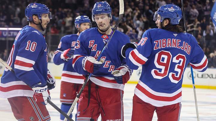 Oct 6, 2026; New York, New York, USA;  New York Rangers left wing Alexis Lafreniere (13) celebrates with his teammates after scoring a goal in the third period against the New York Islanders at Madison Square Garden.  Mandatory Credit: Wendell Cruz-Imagn Images