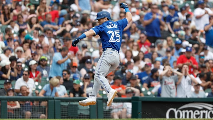 May 26, 2024; Detroit, Michigan, USA; Toronto Blue Jays outfielder Daulton Varsho (25) celebrates as he rounds the bases after hitting a home run in the eighth inning of the game against the Detroit Tigers at Comerica Park.