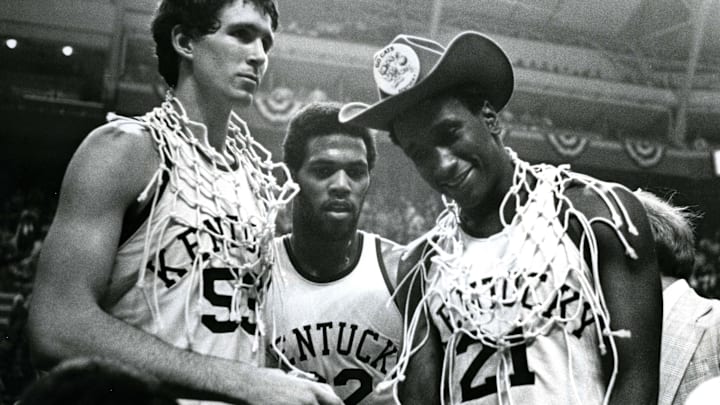 March 27, 1978; St. Louis, MO, USA; FILE PHOTO; Kentucky Wildcats center Rick Robey (53) guard James Lee (32) and Jack Givens (21) celebrate a victory over the Duke Blue Devils during the championship game for the 1978 NCAA men basketball tournament. Kentucky beat Duke 94-88. Mandatory Credit: Malcolm Emmons-Imagn Images