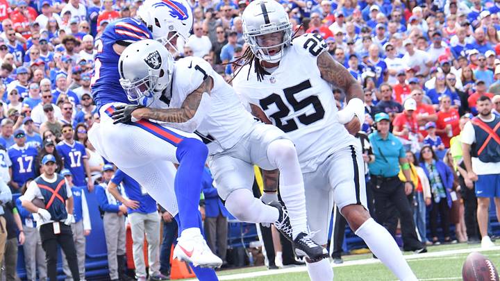 Sep 17, 2023; Orchard Park, New York, USA; Las Vegas Raiders safety Marcus Epps (1) and safety Tre'von Moehrig (25) break up a pass intended for Buffalo Bills tight end Dalton Kincaid (86) in the second quarter at Highmark Stadium. Mandatory Credit: Mark Konezny-USA TODAY Sports