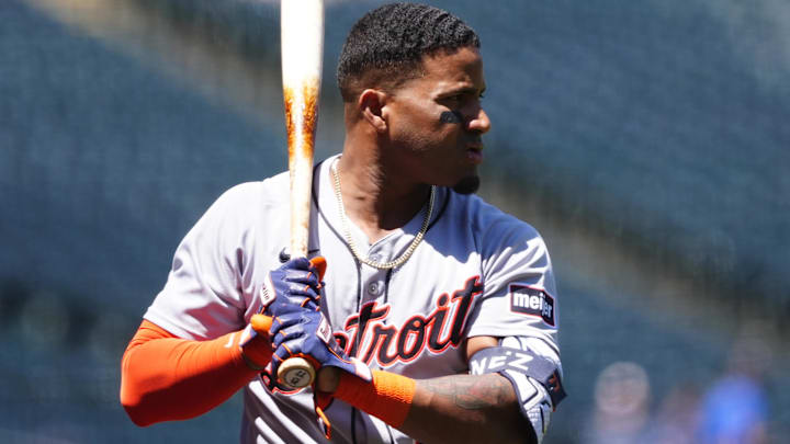 Detroit Tigers third baseman Andy Ibanez (77) warms up before the game against the Colorado Rockies at Coors Field.
