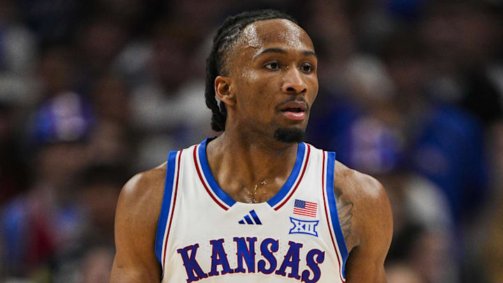 Dec 7, 2025; Kansas City, Missouri, USA; Kansas Jayhawks guard Darryn Peterson (22) reacts during the first half against the Missouri Tigers at T-Mobile Center. Mandatory Credit: Jay Biggerstaff-Imagn Images
