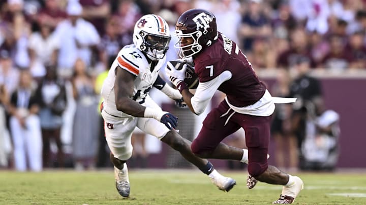 Texas A&M Aggies wide receiver KC Concepcion (7) runs the ball against the Auburn Tigers during the second half at Kyle Field. Texas A&M Aggies wide receiver KC Concepcion (7) runs the ball against the Auburn Tigers during the second half at Kyle Field.