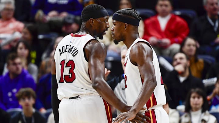 Dec 31, 2022; Salt Lake City, Utah, USA; Miami Heat forward Jimmy Butler (22) and center/forward Bam Adebayo (13) talk before a free-throw shot against the Utah Jazz during the second half at Vivint Arena. Mandatory Credit: Christopher Creveling-Imagn Images Dec 31, 2022; Salt Lake City, Utah, USA; Miami Heat forward Jimmy Butler (22) and center/forward Bam Adebayo (13) talk before a free-throw shot against the Utah Jazz during the second half at Vivint Arena. Mandatory Credit: Christopher Creveling-Imagn Images