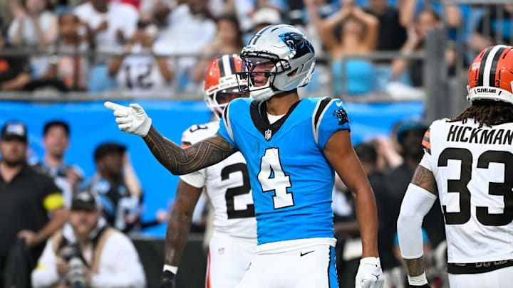 Aug 8, 2025; Charlotte, North Carolina, USA;  Carolina Panthers wide receiver Tetairoa McMillan (4) reacts in the first quarter at Bank of America Stadium. Mandatory Credit: Bob Donnan-Imagn Images