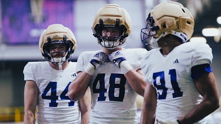 Hayden Moore, Jacob Lane and Isaiah Ward each are edge-rusher candidates for the Huskies. Hayden Moore, Jacob Lane and Isaiah Ward each are edge-rusher candidates for the Huskies.