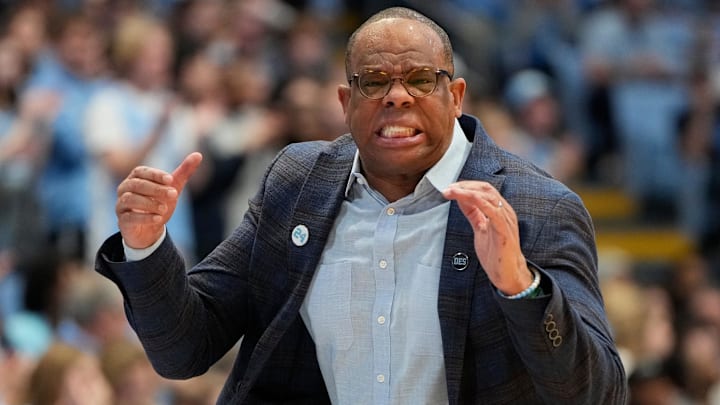 Mar 1, 2025; Chapel Hill, North Carolina, USA;  North Carolina Tar Heels head coach Hubert Davis reacts in the first half at Dean E. Smith Center. Mandatory Credit: Bob Donnan-Imagn Images