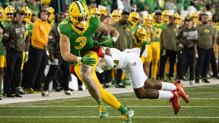 Oregon tight end Terrance Ferguson carries the ball for the Ducks as the Oregon Ducks host the Maryland Terrapins at Autzen Stadium Saturday, Nov. 9, 2024 in Eugene, Ore. Oregon tight end Terrance Ferguson carries the ball for the Ducks as the Oregon Ducks host the Maryland Terrapins at Autzen Stadium Saturday, Nov. 9, 2024 in Eugene, Ore.