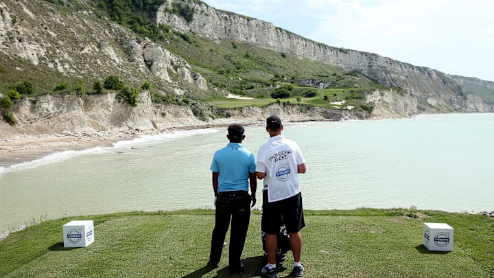 Thongchai Jaidee and caddie contemplating the tee shot - Volvo World Match Play Championship