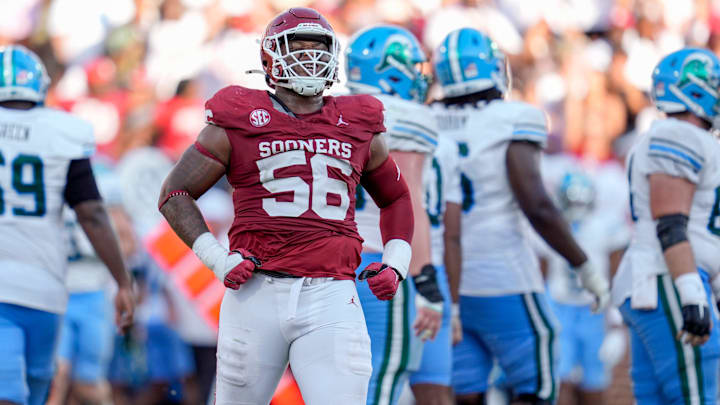 Oklahoma Sooners defensive lineman Gracen Halton (56) celebrates after a play during a college football game between the University of Oklahoma Sooners (OU) and the Tulane Green Wave. Oklahoma Sooners defensive lineman Gracen Halton (56) celebrates after a play during a college football game between the University of Oklahoma Sooners (OU) and the Tulane Green Wave.