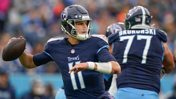 Tennessee Titans quarterback Mason Rudolph (11) looks for a receiver during the third quarter against the Cincinnati Bengals at Nissan Stadium in Nashville, Tenn., Sunday, Dec. 15, 2024.
