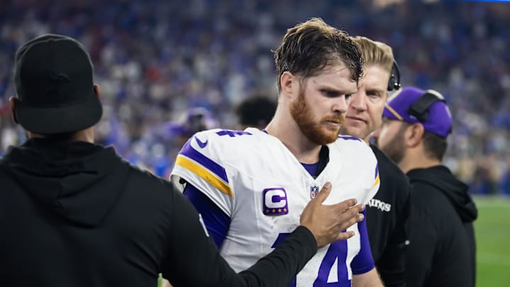 Jan 13, 2025; Glendale, AZ, USA; Minnesota Vikings quarterback Sam Darnold (14) reacts in the closing seconds of the game against the Los Angeles Rams during an NFC wild card game at State Farm Stadium. Mandatory Credit: Mark J. Rebilas-Imagn Images