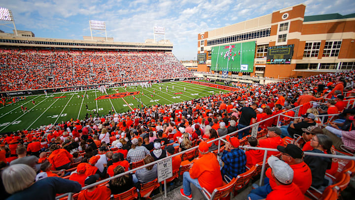 Fans fill the stadium during a Bedlam college football game between the Oklahoma State University Cowboys (OSU) and the University of Oklahoma Sooners (OU) at Boone Pickens Stadium in Stillwater, Okla., Saturday, Nov. 4, 2023.