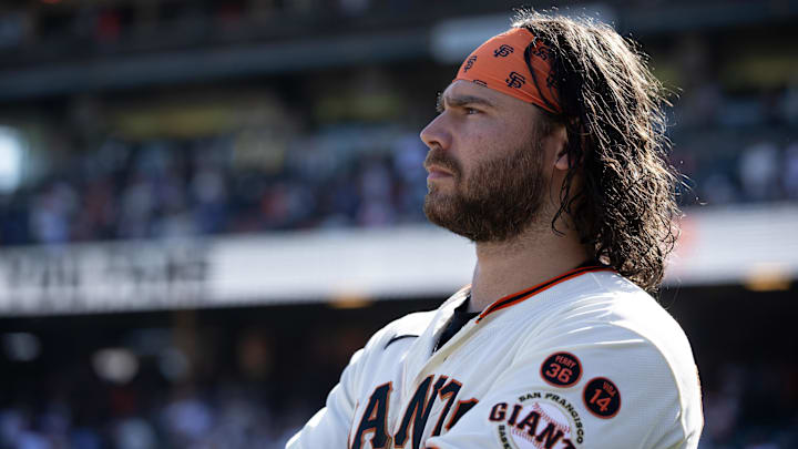 Oct 1, 2023; San Francisco, California, USA; San Francisco Giants shortstop Brandon Crawford watches a tape of season highlights following the final game of the season, against the Los Angeles Dodgers, at Oracle Park. Oct 1, 2023; San Francisco, California, USA; San Francisco Giants shortstop Brandon Crawford watches a tape of season highlights following the final game of the season, against the Los Angeles Dodgers, at Oracle Park.