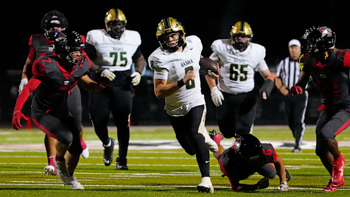 Basha quarterback sprints for a first down against Williams Field during a game at Williams Field High School in Gilbert, on Sept. 12, 2025.
