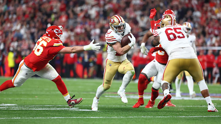 Feb 11, 2024; Paradise, Nevada, USA; San Francisco 49ers running back Christian McCaffrey (23) scores a touchdown in the first half of Super Bowl LVIII at Allegiant Stadium. Mandatory Credit: Mark J. Rebilas-USA TODAY Sports