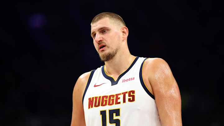 Nov 29, 2025; Phoenix, Arizona, USA; Denver Nuggets center Nikola Jokic (15) against the Phoenix Suns in the first half at the Mortgage Matchup Center. Nov 29, 2025; Phoenix, Arizona, USA; Denver Nuggets center Nikola Jokic (15) against the Phoenix Suns in the first half at the Mortgage Matchup Center.