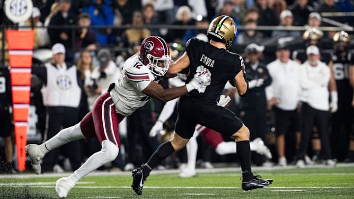 South Carolina Gamecocks edge Jatius Geer (12) goes to take down Vanderbilt Commodores quarterback Diego Pavia (2) during the second half of the game at FirstBank Stadium in Nashville, Tenn., Saturday, Nov. 9, 2024.