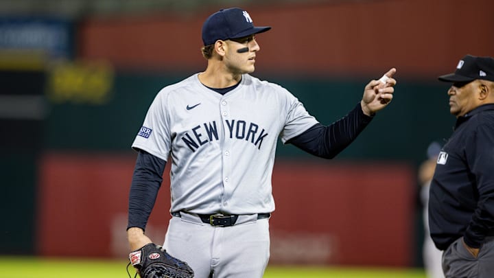 Sep 20, 2024; Oakland, California, USA; New York Yankees first baseman Anthony Rizzo (48) talks to a fan during the seventh inning against the Oakland Athletics at Oakland-Alameda County Coliseum. Mandatory Credit: Bob Kupbens-Imagn Images