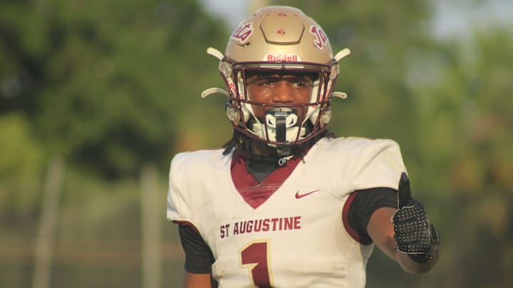 St. Augustine wide receiver Somourian Wingo (1) responds to a signal from the sideline with a thumbs-up against Bishop Kenny during a high school spring football game on May 21, 2025. [Clayton Freeman/Florida Times-Union]