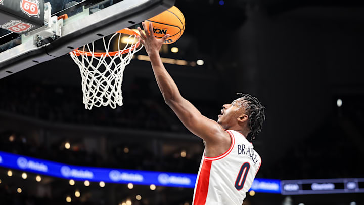 Arizona Wildcats guard Jaden Bradley (0).