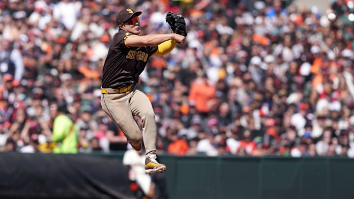 Apr 7, 2024; San Francisco, California, USA; San Diego Padres shortstop Ha-Seong Kim (7) throws the ball to second base to record an out against the San Francisco Giants during the sixth inning at Oracle Park. Apr 7, 2024; San Francisco, California, USA; San Diego Padres shortstop Ha-Seong Kim (7) throws the ball to second base to record an out against the San Francisco Giants during the sixth inning at Oracle Park.
