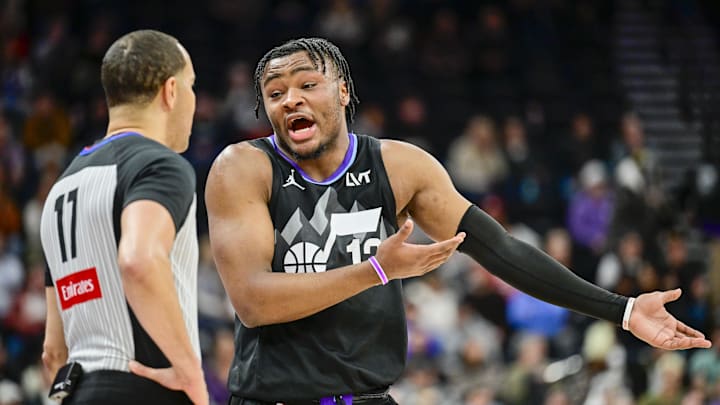 Feb 13, 2025; Salt Lake City, Utah, USA; Utah Jazz guard Isaiah Collier (13) argues with referee Jonathan Sterling (17) against the LA Clippers during overtime at the Delta Center. Mandatory Credit: Christopher Creveling-Imagn Images