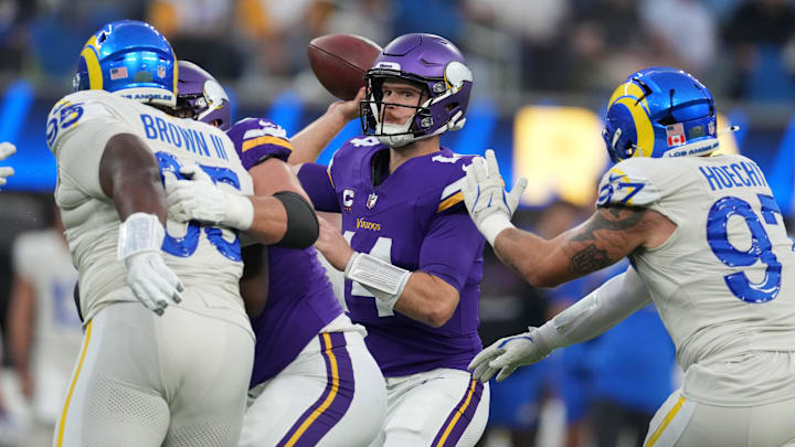 Oct 24, 2024; Inglewood, California, USA; Minnesota Vikings quarterback Sam Darnold (14) throws the ball against the Los Angeles Rams in the first half at SoFi Stadium.