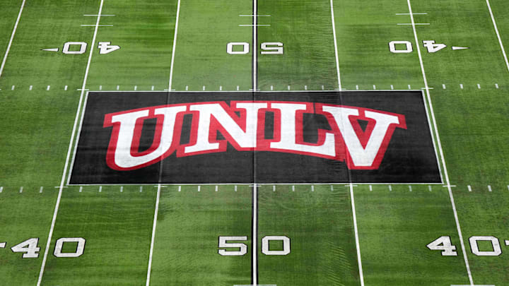 The UNLV Rebels logo at midfield during the Mountain West Championship at Allegiant Stadium. Mandatory Credit: Kirby Lee-Imagn Images The UNLV Rebels logo at midfield during the Mountain West Championship at Allegiant Stadium. Mandatory Credit: Kirby Lee-Imagn Images