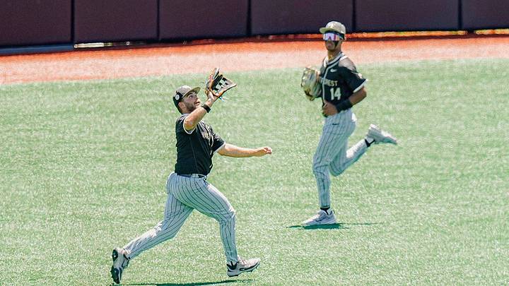 Wake Forest outfielder Boston Torres moves under ball in the field Wake Forest outfielder Boston Torres moves under ball in the field